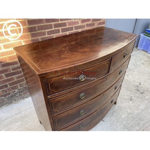 317 - A Victorian mahogany bow front chest of five drawers