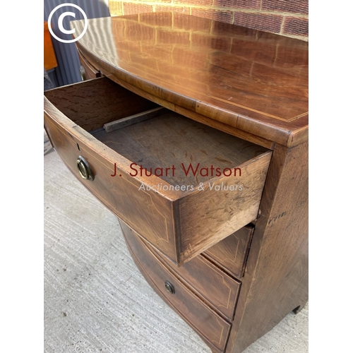 317 - A Victorian mahogany bow front chest of five drawers