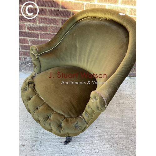 321 - A Victorian green upholstered nursing chair