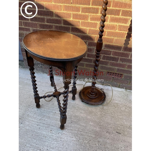 324 - An oak barley Twist occasional table together with an oak standard lamp