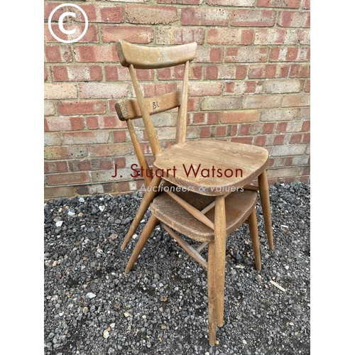 33 - A pair of Ercol stacking chairs