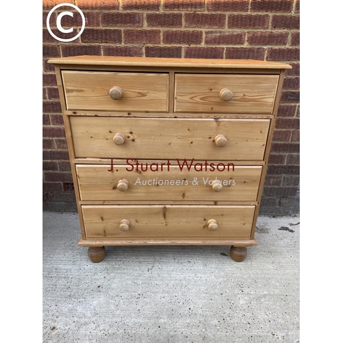 333 - A solid pine chest of five drawers