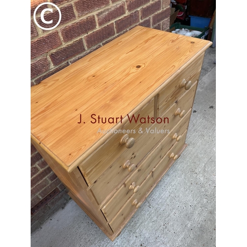 333 - A solid pine chest of five drawers