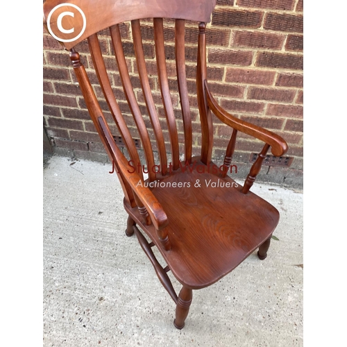 343 - A country pine Windsor carver chair