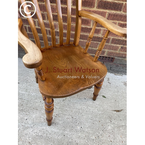 344 - A country pine Windsor carver chair