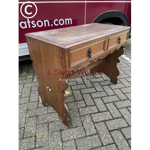 350 - An  arts and crafts style two drawer writing table