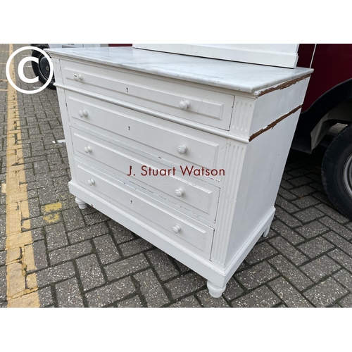 351 - A continental white painted marble top chest with a mirror back