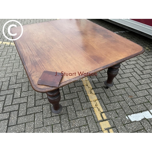 356 - A large Victorian mahogany dining table