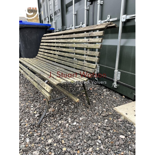 361 - A scrollwork metal frame garden bench with wooden slatted seat