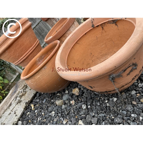 363 - A collection of 14 terracotta pots, together with two large plastic terracotta effect pots and 15 te... 