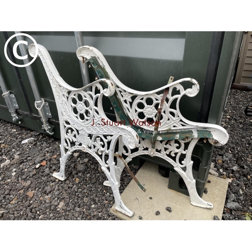 376 - A pair of white painted bench ends