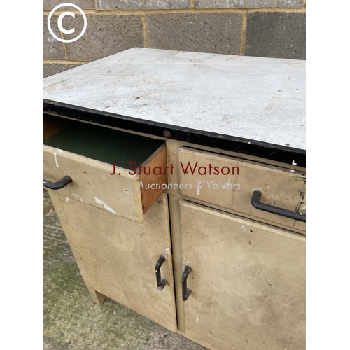 389 - A vintage enamel top laundry sideboard