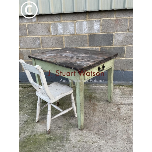 390 - A vintage pine part painted kitchen table with a single drawer, together with a painted Windsor chai... 