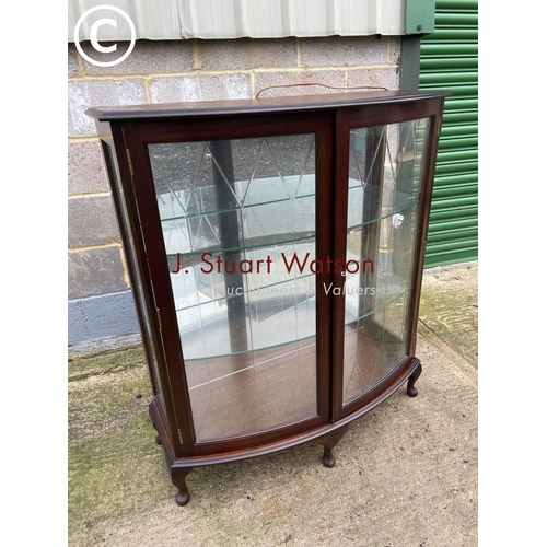 408 - A reproduction mahogany bow front china cabinet