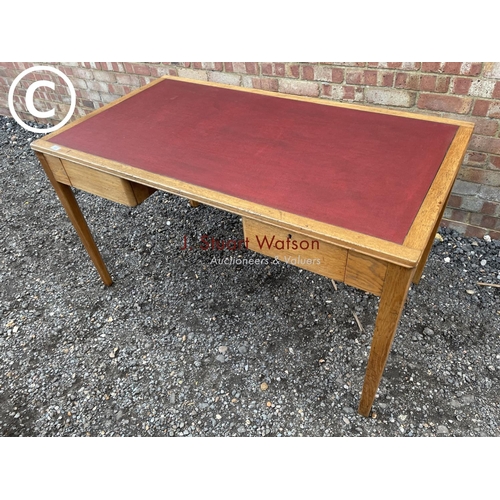 41 - A 20th century oak writing table of military purpose, stamped ER to underside