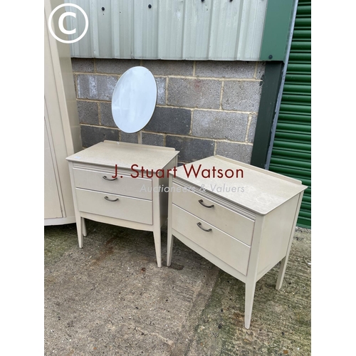 412 - A mid century grey painted ply bedroom suite consisting of a chest of two, a dressing chest and a si... 