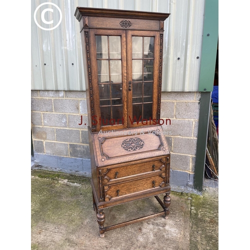 432 - A 20th century oak bureau bookcase