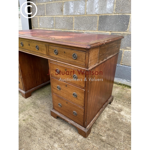 434 - A Victorian mahogany pedestal office desk with a red leather top