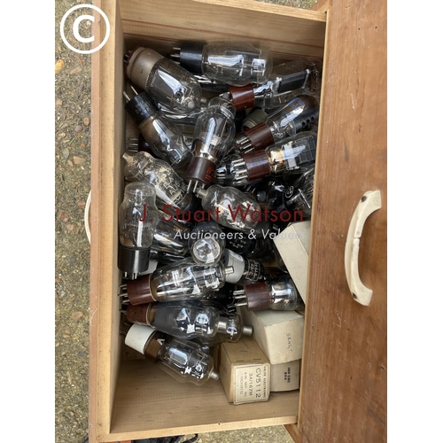 458 - A ply bank of 7 drawers filled with a large selection of valves and fuses