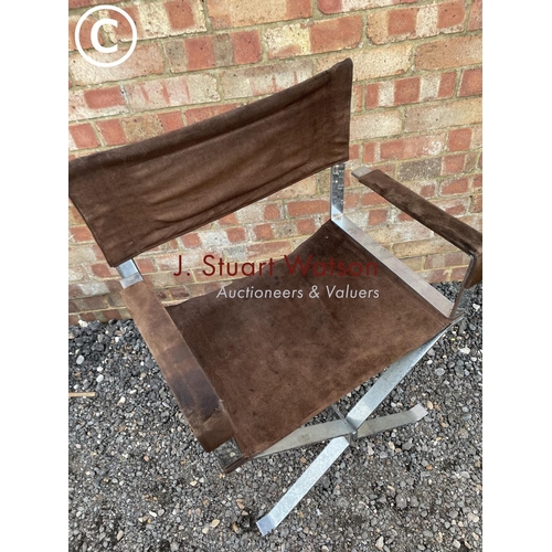 48 - A chrome and brown suede directors chair