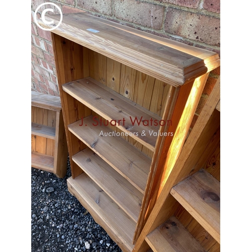 5 - A collection of open fronted solid pine book shelves