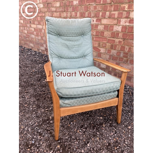 55 - A mid century fire side chair