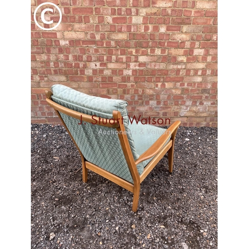 55 - A mid century fire side chair