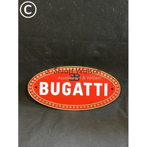 568 - Cast iron Bugatti plaque, 35cms diameter