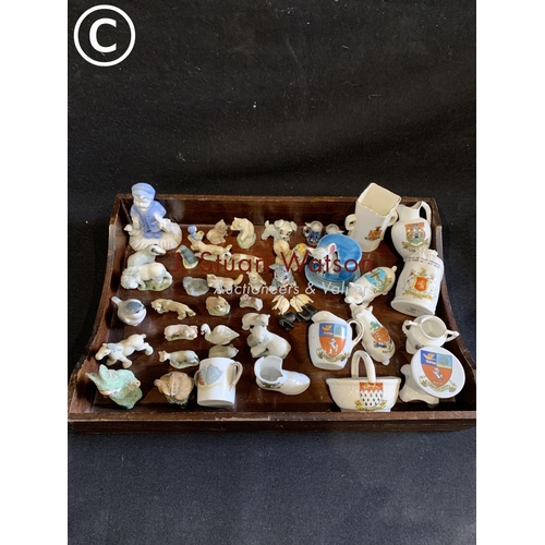 610 - Collection of Wade and other small figures and crestedware