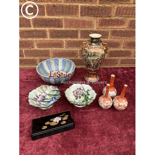 644 - Oriental vases and bowls and Lotus rack