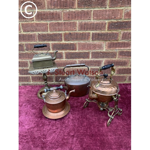 647 - Copper and brass kettles