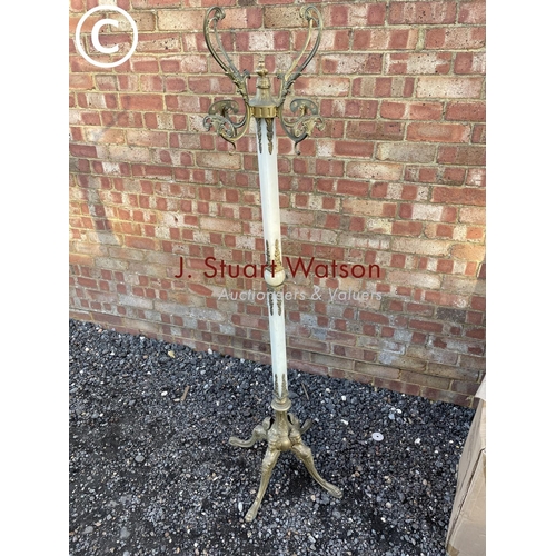 73 - A brass and onyx ornate coat stand 165cm tall