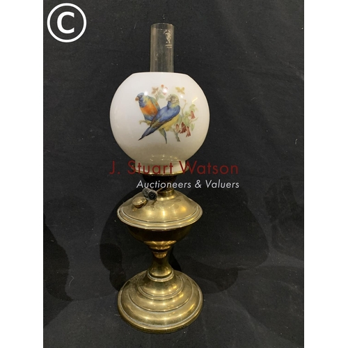 797 - Victorian brass oil lamp with painted parrot decorated shade, Height 57cms