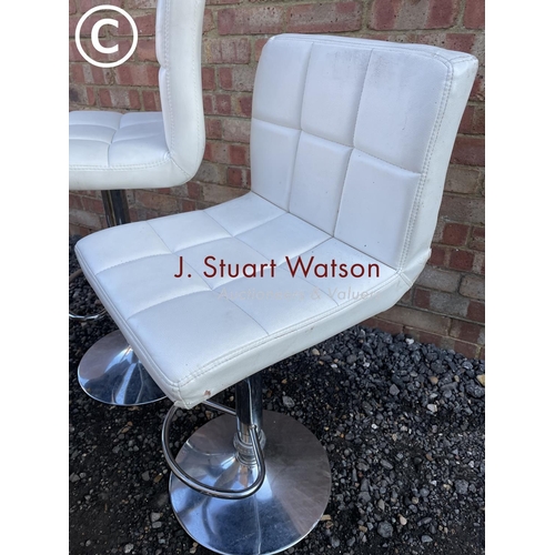 92 - Three modern white bar stools together with a wicker linen basket