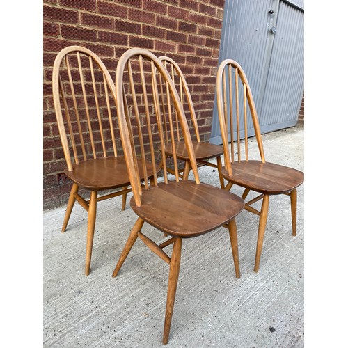 433 - A set of four Ercol stick back dining chairs