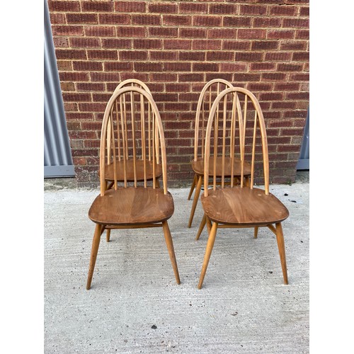 433 - A set of four Ercol stick back dining chairs