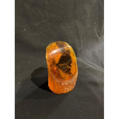 634 - Amber paperweight height 10 cms