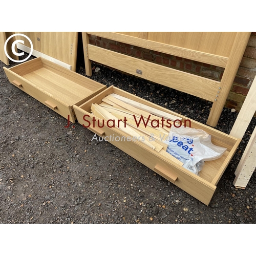 332 - A modern light oak double bed frame with two drawers, complete with all fixings, slats etc in excell... 