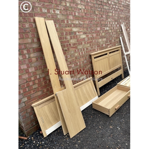 332 - A modern light oak double bed frame with two drawers, complete with all fixings, slats etc in excell... 