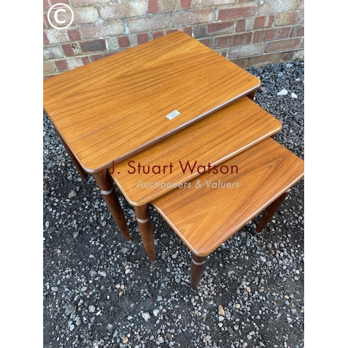 334 - A danish style teak nest of three occasional tables