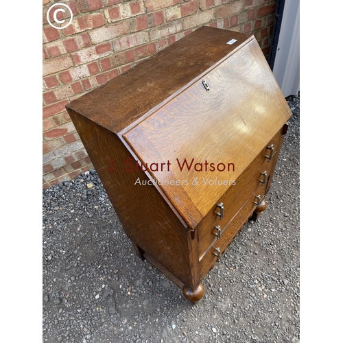 111 - An deco style early 20th century oak bureau