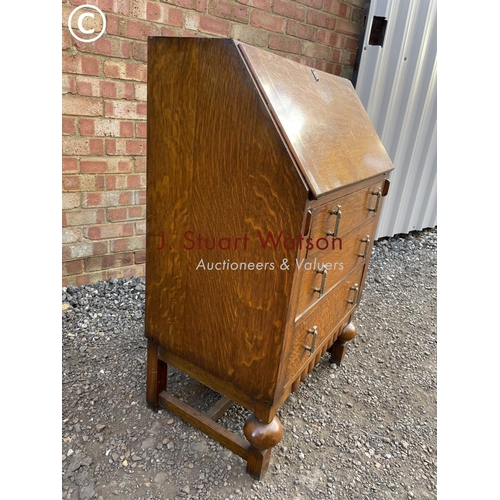 111 - An deco style early 20th century oak bureau