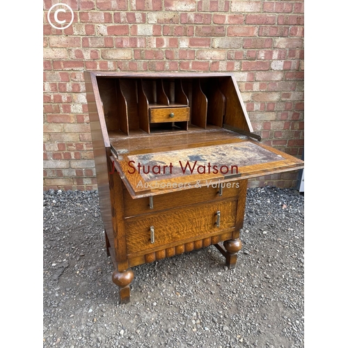 111 - An deco style early 20th century oak bureau