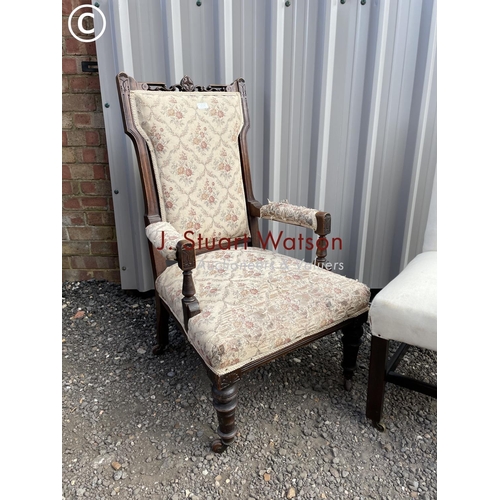 128 - An edwardian mahogany armchair together with another mahogany framed chair