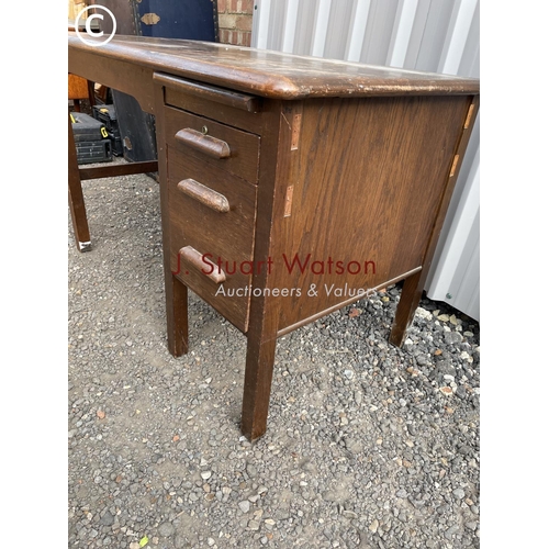 138 - A 20th century oak office desk