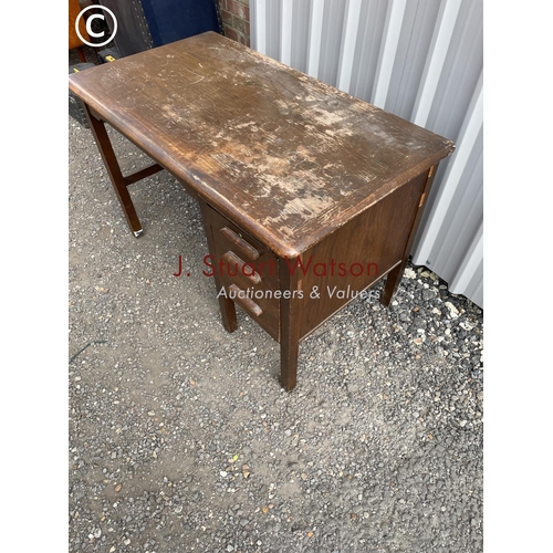 138 - A 20th century oak office desk