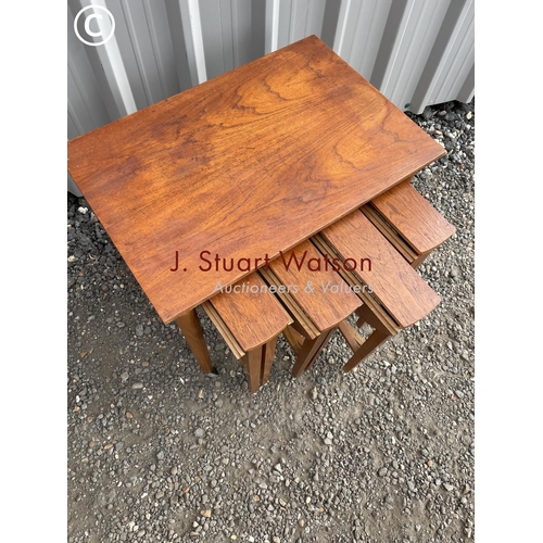 140 - A danish style teak nest of five tables