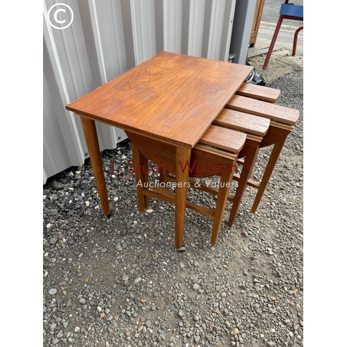 140 - A danish style teak nest of five tables