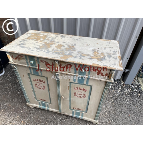 153 - A continental painted pine sideboard with two drawers over two cupboards