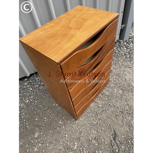 158 - A mid century ply chest of six drawers